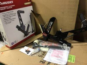 lot 92 image: Pneumatic 3-in-1 15.5-Gauge and 16-Gauge 2 in. Flooring Nailer and Stapler with Quick Jam Release by Husky in good condition