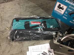 lot 104 image: Makita 18-Volt X2 LXT 5.0Ah Lithium-Ion (36-Volt) Brushless Cordless Rear Handle 7-14 in. Circular Saw missing batteriers not used