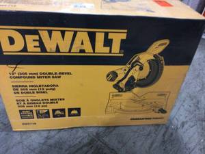 lot 105 image: Dewalt 15 Amp Corded 12 in. Double Bevel Sliding Compound Miter Saw not used