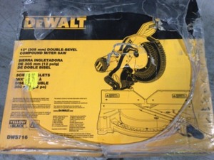 lot 103 image: Dewalt DWS716 15 AMP 12 IN. ELECTRIC DOUBLE-BEVEL COMPOUND MITER SAW not used