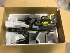lot 104 image: RYOBI 15 Amp 10 in. Sliding Compound Miter Saw in good conditions