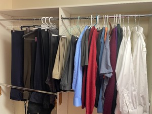 lot 63 image: Closet of Mens Suit Coats, Pants, Sweaters, Pants, and Even a Tux