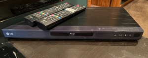 lot 80 image: LG 59 inch TV and DVD Player