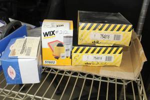 lot 96 image: Lot of (4) Filters and Pumps - Dominion Authority 5 754018 (x2), Wix Filter 51602, Allison Automatic Pump