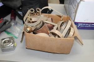 lot 110 image: Lot of Brass and Copper Brackets and Pipe Sections