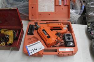 lot 219 image: Paslode Impulse Cordless Nailer, Charger, Battery, Case, Fasteners