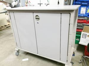 lot 22 image: WOW MSRP $6000 Herman Miller Milcare Locking Procedure and Supply Storage Cart Double Wide Cabinet With Doors That Can Open & Tuck Away To The Sides Includes Organizing Drawers & Coated Wire Shelving - Excellent Condition - No Key