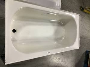 lot 33 image: American Standard Bathtub and shower floor  in decent condition (see pics carefully) (has dents and scratches)