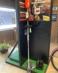 lot 242 image: New Echo Weed Eater, 58-volt battery powered