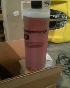 lot 295 image: 12 Quarts of John Deere Refrigeration Oil