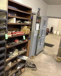 lot 21 image: Metal Shelving Unit, Briggs & Stratton Parts, shelf contents included