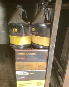 lot 317 image: John Deere 2 Cycle Oil, 2 Gallons of Bar & Chain Oil