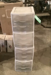 lot 372 image: Three Drawer Storage Units containing lawn mower manuals
