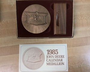 lot 233H image: John Deere Calendar Medallion 1985