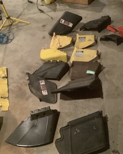 lot 327 image: Quantity of Mower Chutes & Plugs