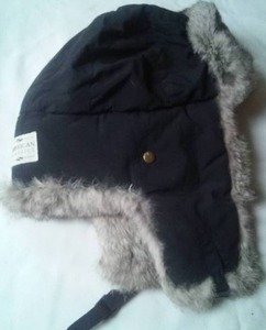 lot 56 image: Cloth bomber hat with Rabbit Fur