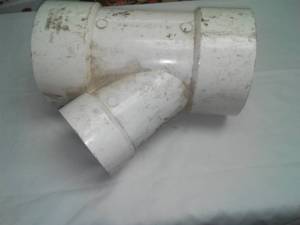 lot 63 image: Y PVC 6 inch inside diameter x 4 in. New, Charlotte Pipe & Foundry, schedule 40.