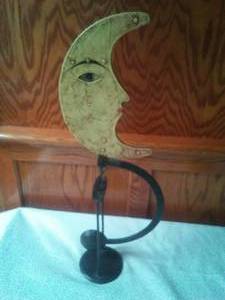 lot 91 image: Cast & metal shifting moon