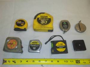 lot 150 image: 7 tape measures  Stanley, Lufkin & more