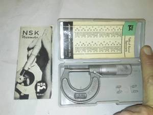 lot 154 image: NSK 0.1  micrometer in case with manual.