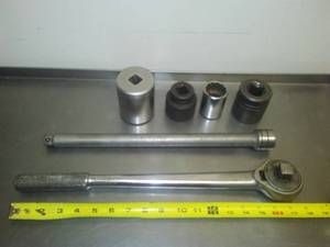 lot 335 image: Socket Wrench & extension  in.  drive plus 4 sockets