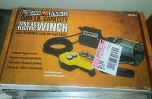 lot 376 image: Badlands 120 volt Winch - New in Box. 1500 pound lift