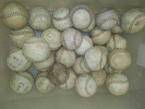 lot 454 image: Tote of Softballs - over 2 dozen.