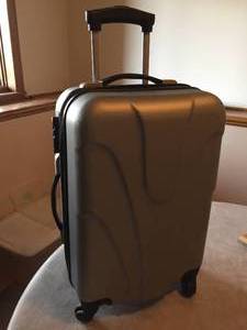 lot 42 image: Rolling Silver Suitcase
