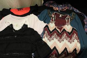8 shirts and a dress size XS...