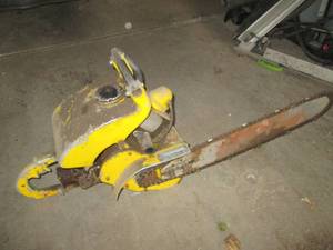 lot 16 image: Vintage chain saw, has compression...