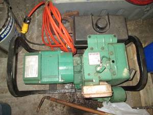 lot 18 image: Coleman powermate generator...