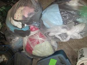 lot 26 image: Several bags of clothing, assorted ...