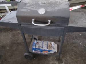 lot 31 image: Charcoal grill...