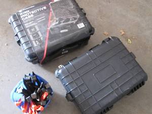 lot 45 image: 2 protective hardshell cases and te...