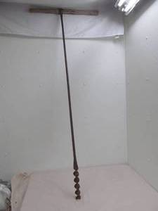 lot 22 image: vintage t handle auger bit