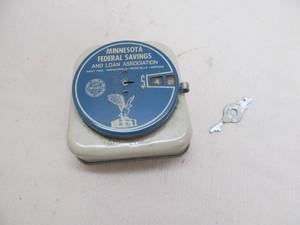 lot 44 image: vintage Minnesota federal savings & loan coin bank