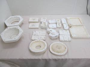 lot 186 image: Plaster molds, planters, etc