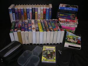 lot 62 image: CHILDRENS VHS MOVIES ANDPSP