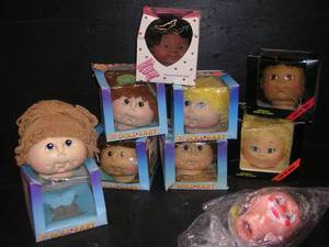 lot 97 image: DOLL HEADS