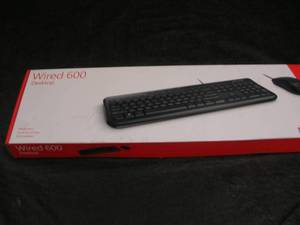 lot 101 image: NEW IN BOX MICROSOFT WIRED 600 DESKTOP KEYBOARD AND MOUSE.