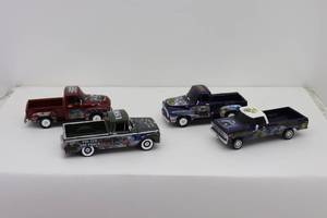 lot 44 image: (4) Hamilton Collection USMC Trucks