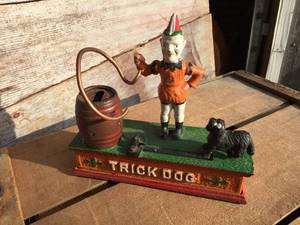 lot 5 image: Cast Iron Trick Dog Bank