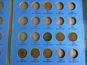 lot 63 image: 7 Indian Head Pennies