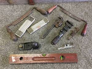 lot 78 image: Antique Tools, Draw Knives, Wrenches, Level, Plane, Rulers