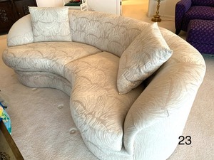 lot 23 image: Luxurious Curved Sofa by Directional