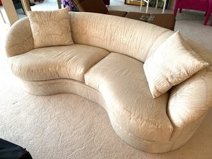 lot 53 image: Luxurious Curved Sofa by Directional