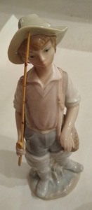 lot 19 image: Lladro Figurine- Gone Fishing