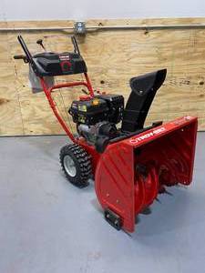 TROY-BILT 24 in. 208 cc Two-Stage Gas Snow Blower with Electric Start Self Propelled.  MSRP $699.00