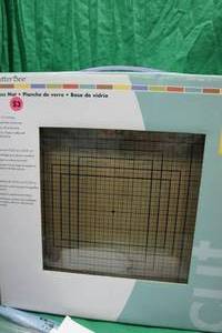 lot 136 image: Cutter Bee Glass Mat, Clear Bags, Creative Memories Page Protectors and More