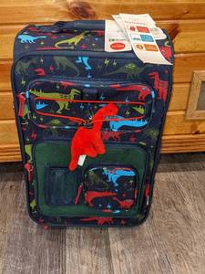 lot 76 image: Multi-Pocket Dinosaur Print Wheeled Carry On